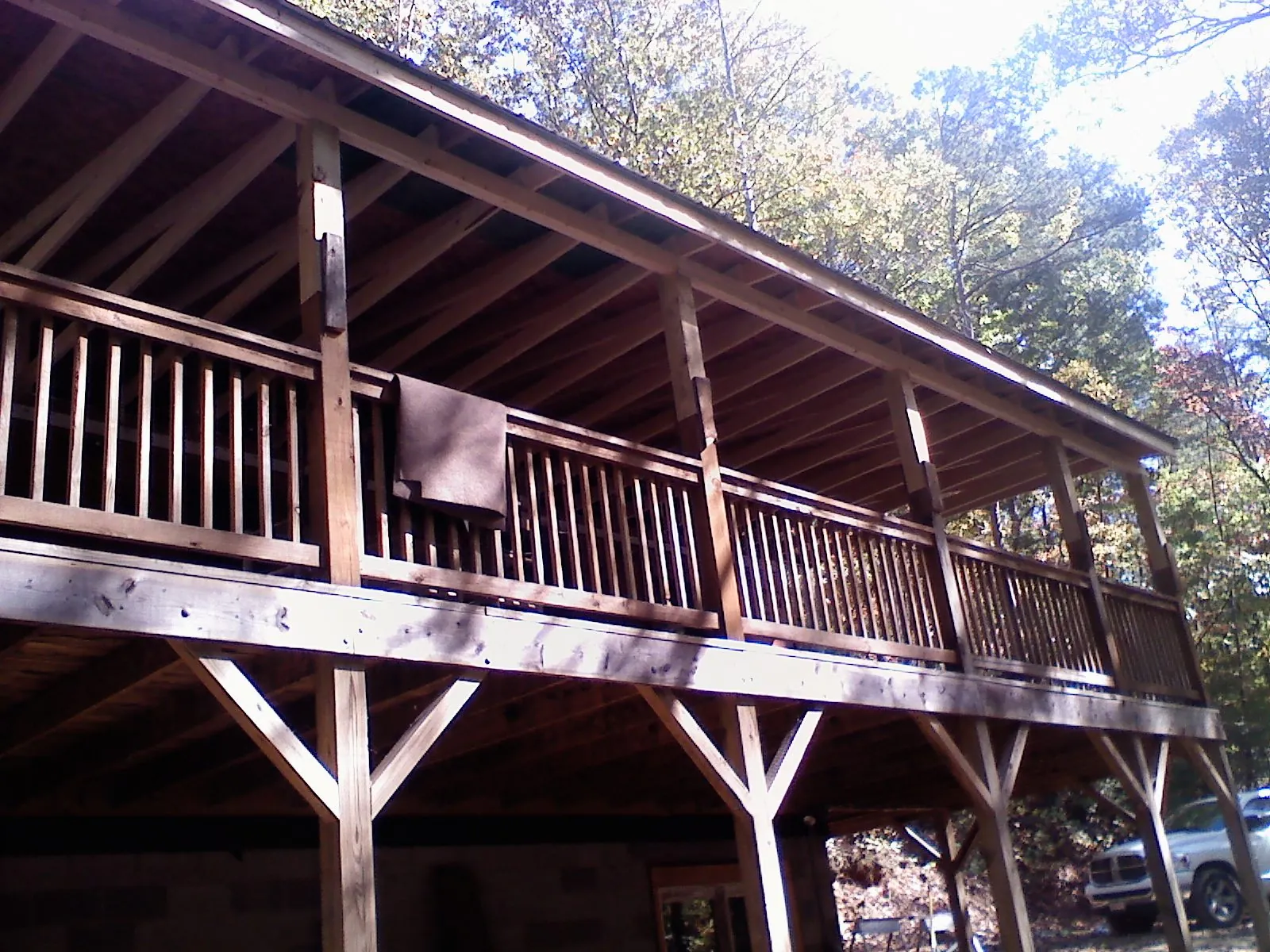 Timber framing under a new elevated porch and deck — Roof Leak Repair in Spring Arbor by Roofing Brothers